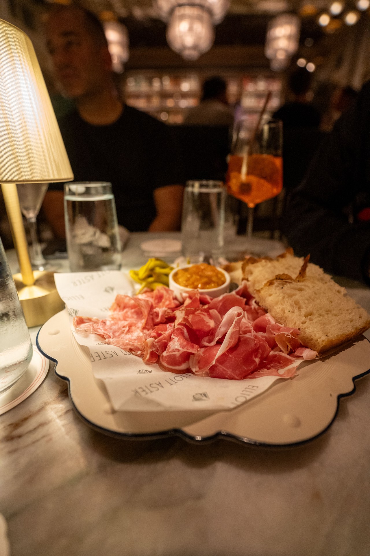 Elliott Aster is a European-inspired restaurant and wine destination in downtown St. Petersburg. Known for its elegant interiors, curated charcuterie, and refined cocktail program, it offers an intimate dining experience.