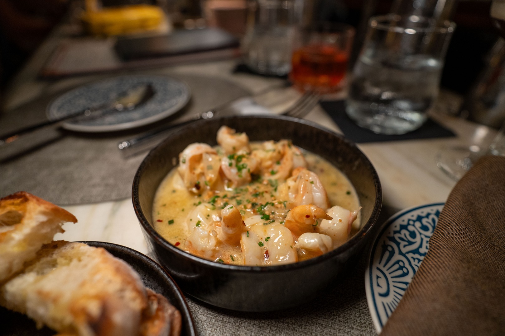 Discover Allelo Wine Bar’s sautéed Gulf shrimp seafood dish in downtown St. Petersburg — elevated flavors paired with wine near Beach Drive NE.